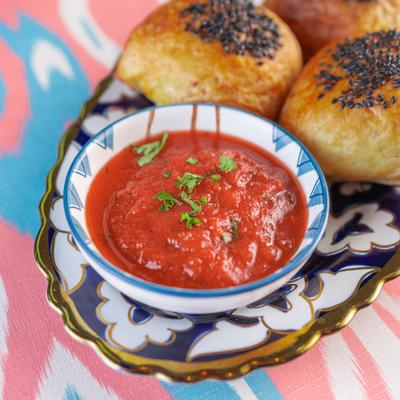 Homemade layered dough, served with sauce.