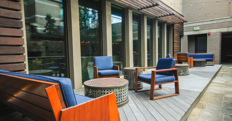 Exterior, patio, modern outdoor chairs and round coffee tables