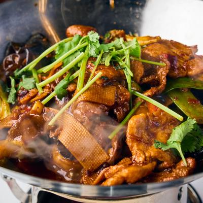 Szechuan Chicken Beef Calamari in a hot wok.