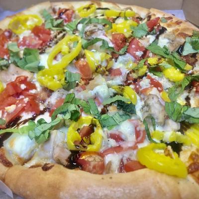 Freshly made pizza pie!.