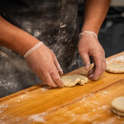 Employee making a pie.