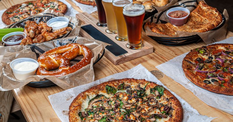 Several dishes served on table, side view