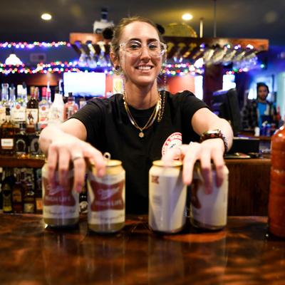Bartender serving beer