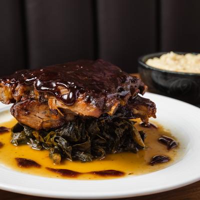BBQ ribs, on a bed of collard greens