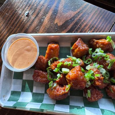 Miso Pork Bites - Pork Tenderloin Fried in our House Breading with our Spicy Mayo.