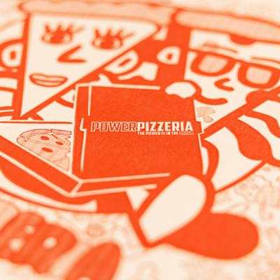 Power Pizzeria logo on branded orange and white pizza box.