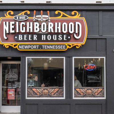 Neighborhood Beer House Newport, exterior, fascia sign and front window.