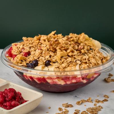 Acai Bowl with berries, banana, granola, honey and chia seeds.
