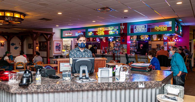 Interior, staff at the front desk counter