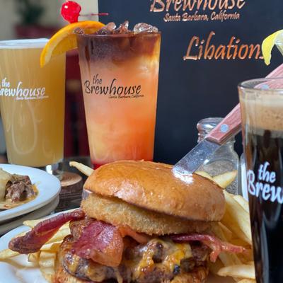 Bacon cheeseburger and various drinks.