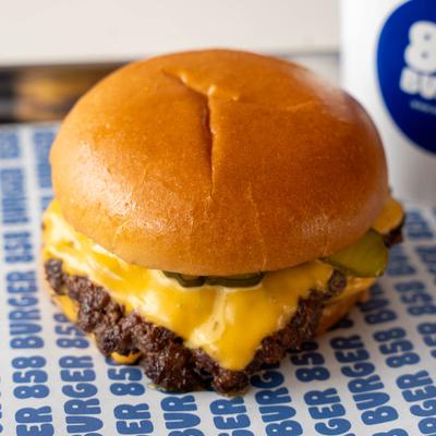 Cheeseburger with melted cheddar and pickles.