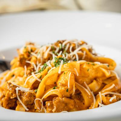 Fettuccine pasta, with Italian sausage, crab meat, vodka sauce, and parmesan.