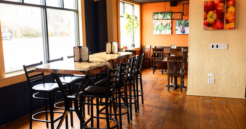 Inside space, tall table and bar stools