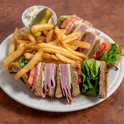 Ham and Swiss cheese club sandwich, and fries.