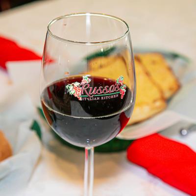 A glass of red wine.