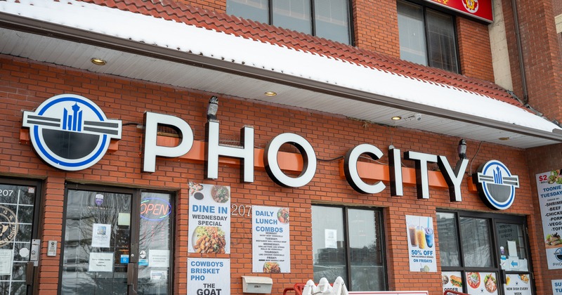 Exterior, entrance to restaurant, sign on the wall above