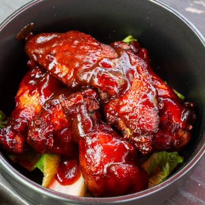 Glazed BBQ chicken wings.
