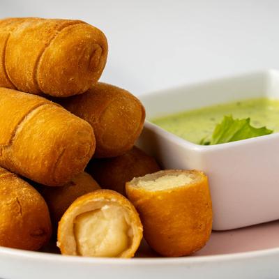 Venezuelan cheese sticks served with cilantro garlic sauce.