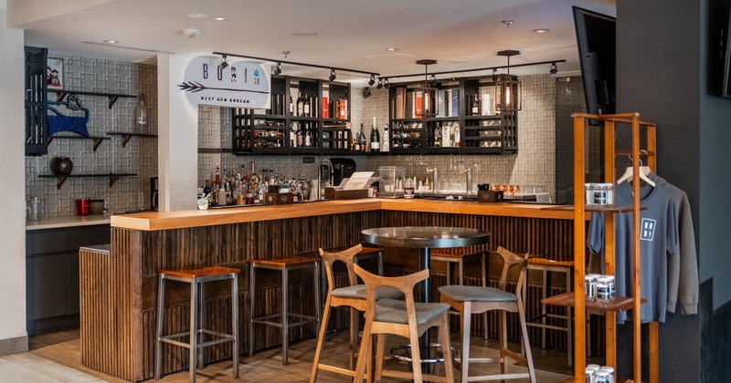 Bar area, tall table and bar stools