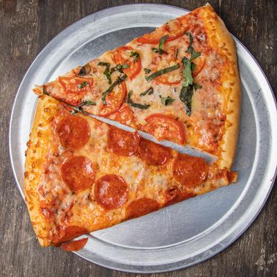 Two slices of Pepperoni and Margarita pizza, top view