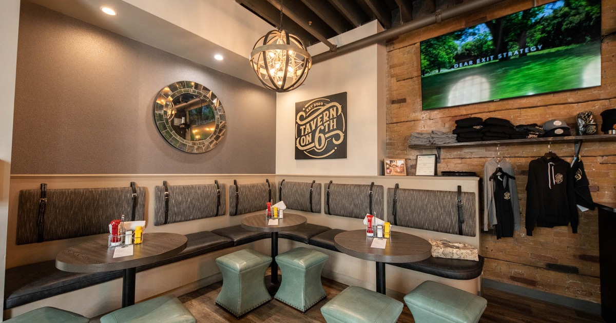 Interior, round tables with stools and benches