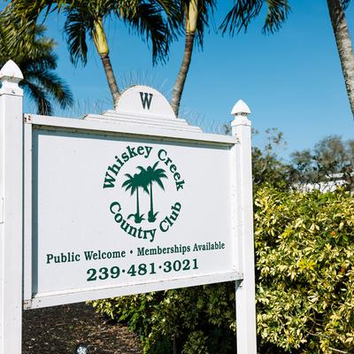 Exterior, Whiskey Creek Country Club sign.