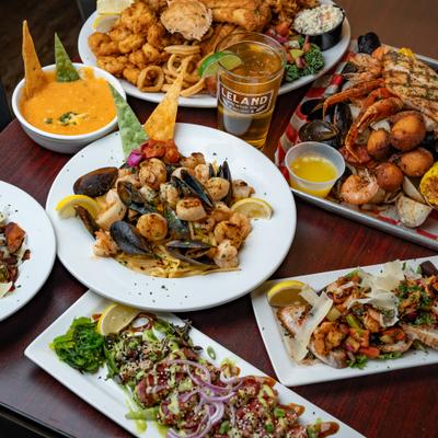 A variety of seafood dishes and platters.