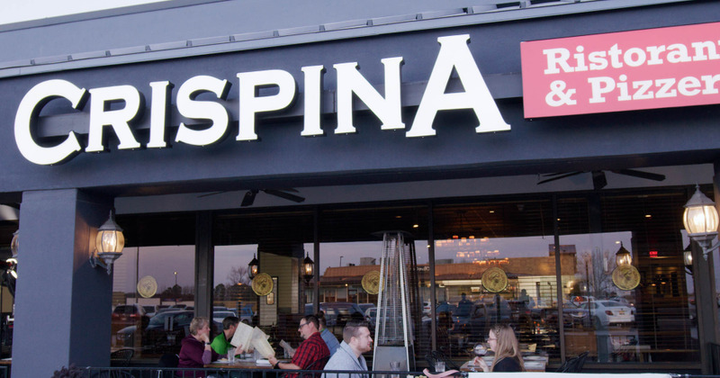 Exterior, tables outside, guests enjoying drinks