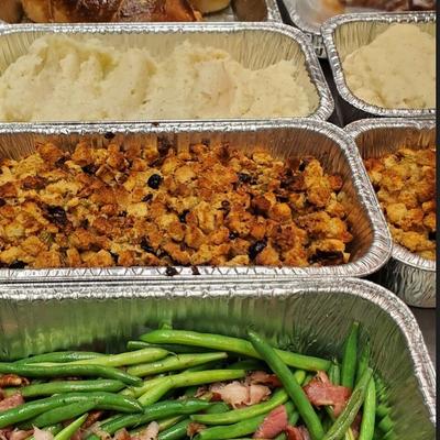 Trays of assorted foods.