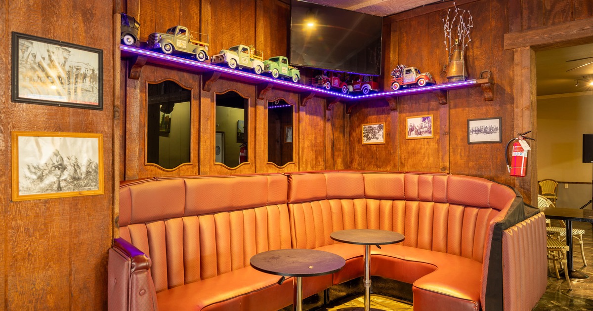 Interior, banquette seating  with tables
