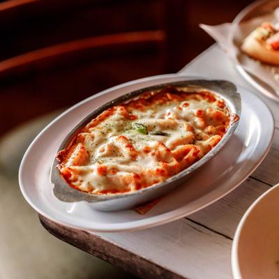 Baked Ziti with ricotta cheese and tomato sauce.