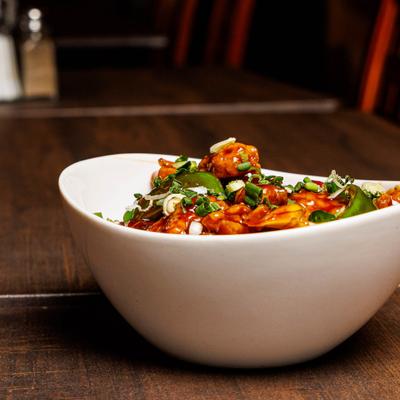 Chilli Chicken with bell peppers, garlic, and soy sauce.