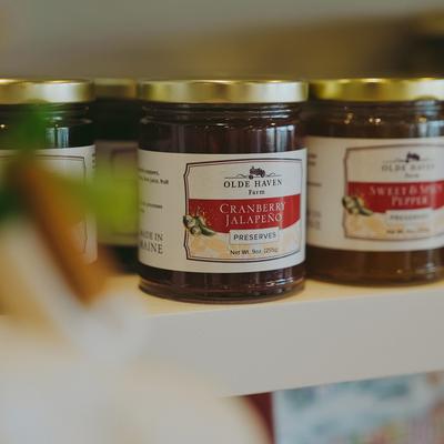 The restaurant's produced goods packed in jars for sale.