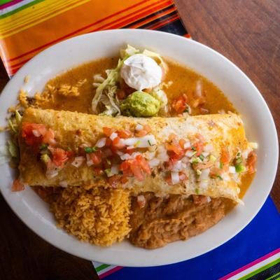 Mega burrito topped with pico de gallo, served with rice, beans, guacamole and sour creme.