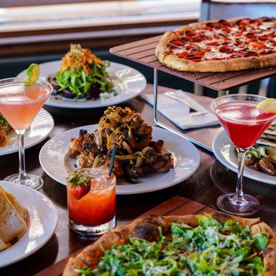 Assorted dishes and cocktail drinks.