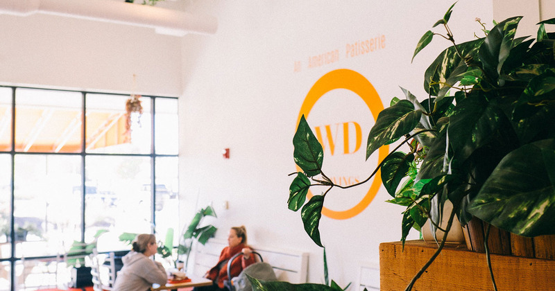 Interior, WD Cravings and a table by the window with guests