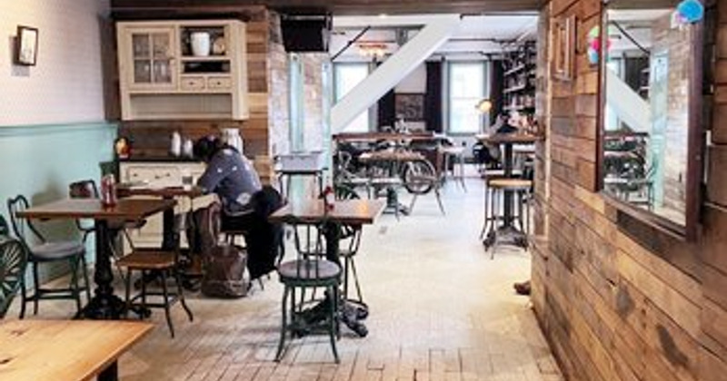 Interior, tables ready for guests