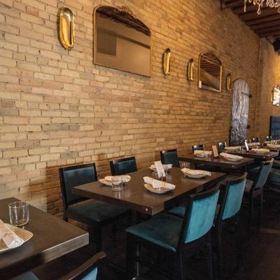 Interior, a row of set dining tables