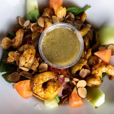 Camarones salad with sauteed shrimp.