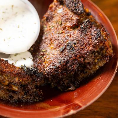 Kibbeh dish, spiced lean ground meat and bulgur wheat.