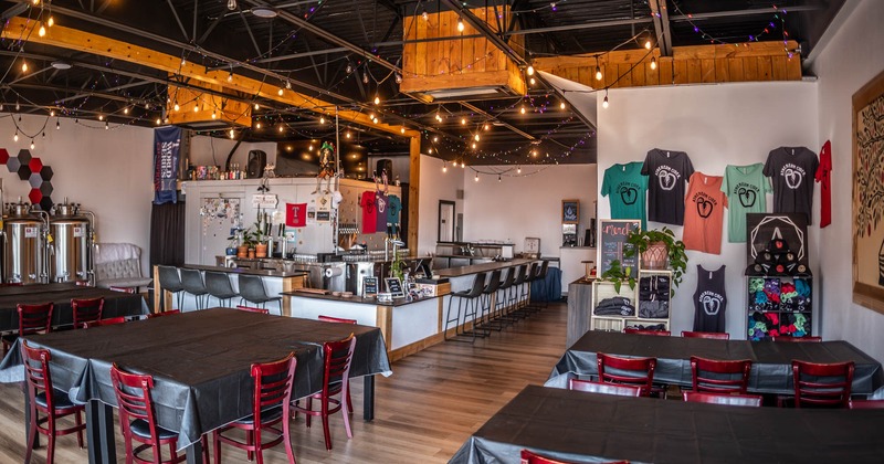Interior, seating area, bar, and restaurant merchandise on the wall