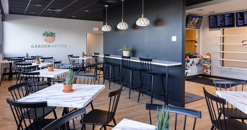 Inside, seating area with plant decoration on the table