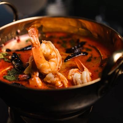 Spicy shrimp soup, close-up.