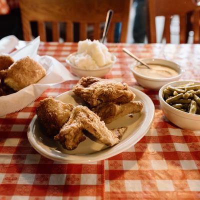 Pan-fried chicken meal seved Family Style.