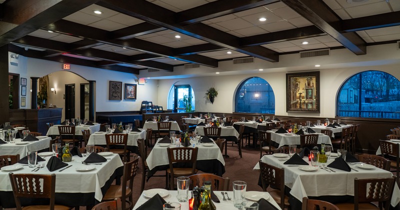 Spacious and cozy interior dining area with set tables, perfect for any special occasion