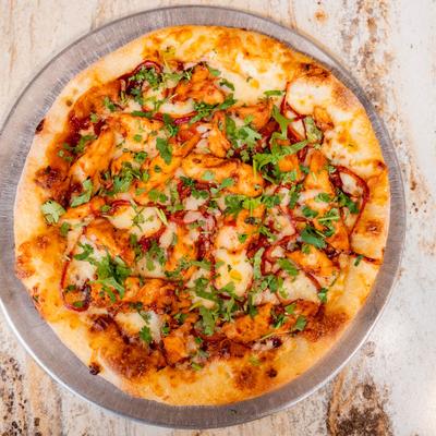 Pepperoni, salami, italian sausage, mushrooms, olives, bell pepper, ground beef, and red sauce.