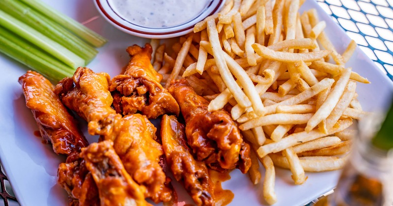 Served wings with fries and dip