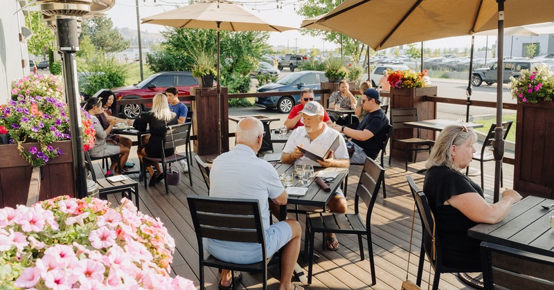 Exterior, terrace, tables and chairs, guests seating, flowers