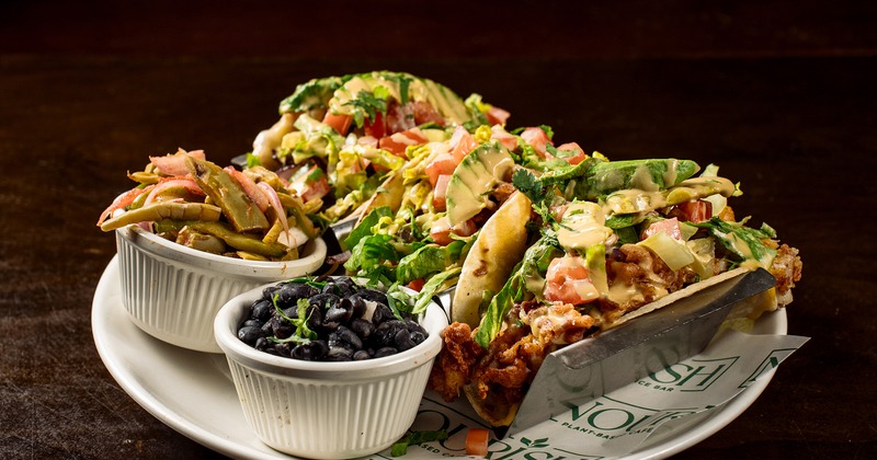 Vegan Tacos, served with salad, and black beans