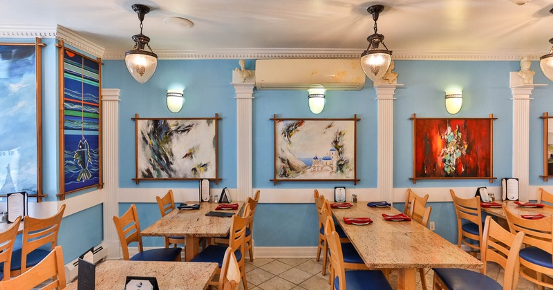 Interior, dining area with pictures on the wall